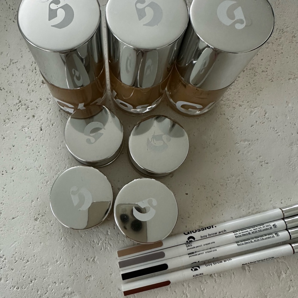 Glossier foundation, concealer, brown pencils